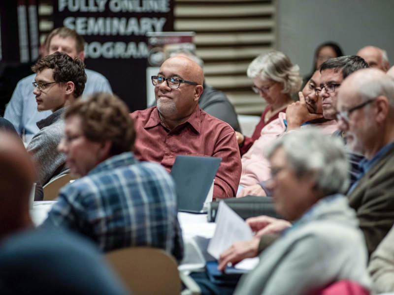 People listening to lecture